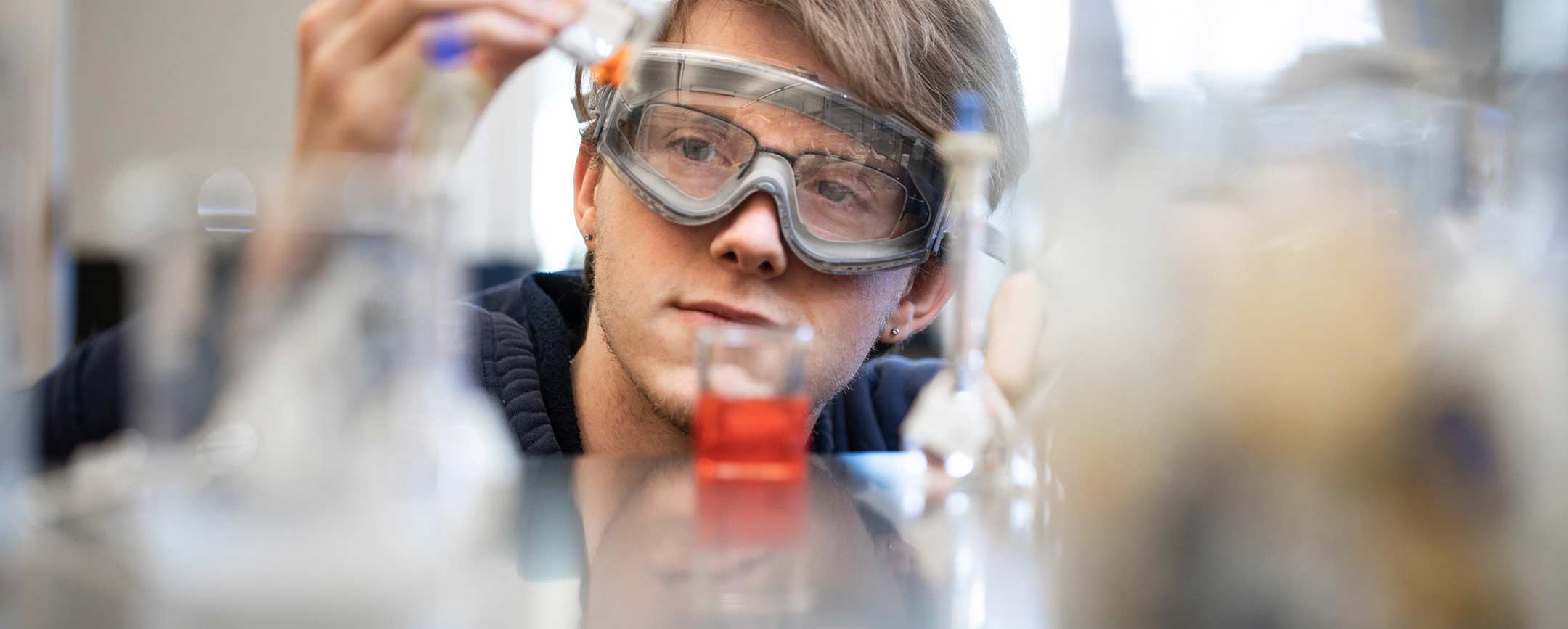 A bachelors in chemistry student work on an experience at Pennsylvania Western University (PennWest)