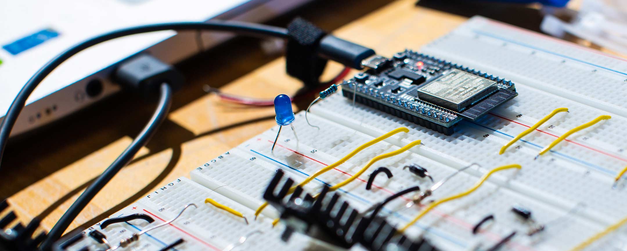 A circuit board with some wires attached