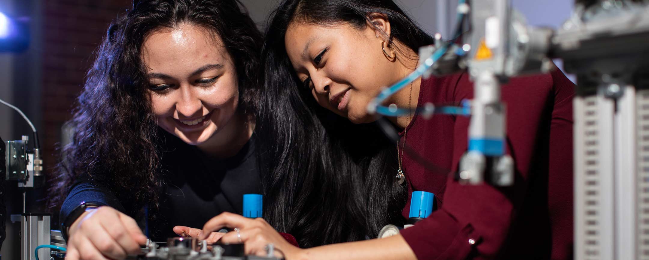 Students working on a mechanical project