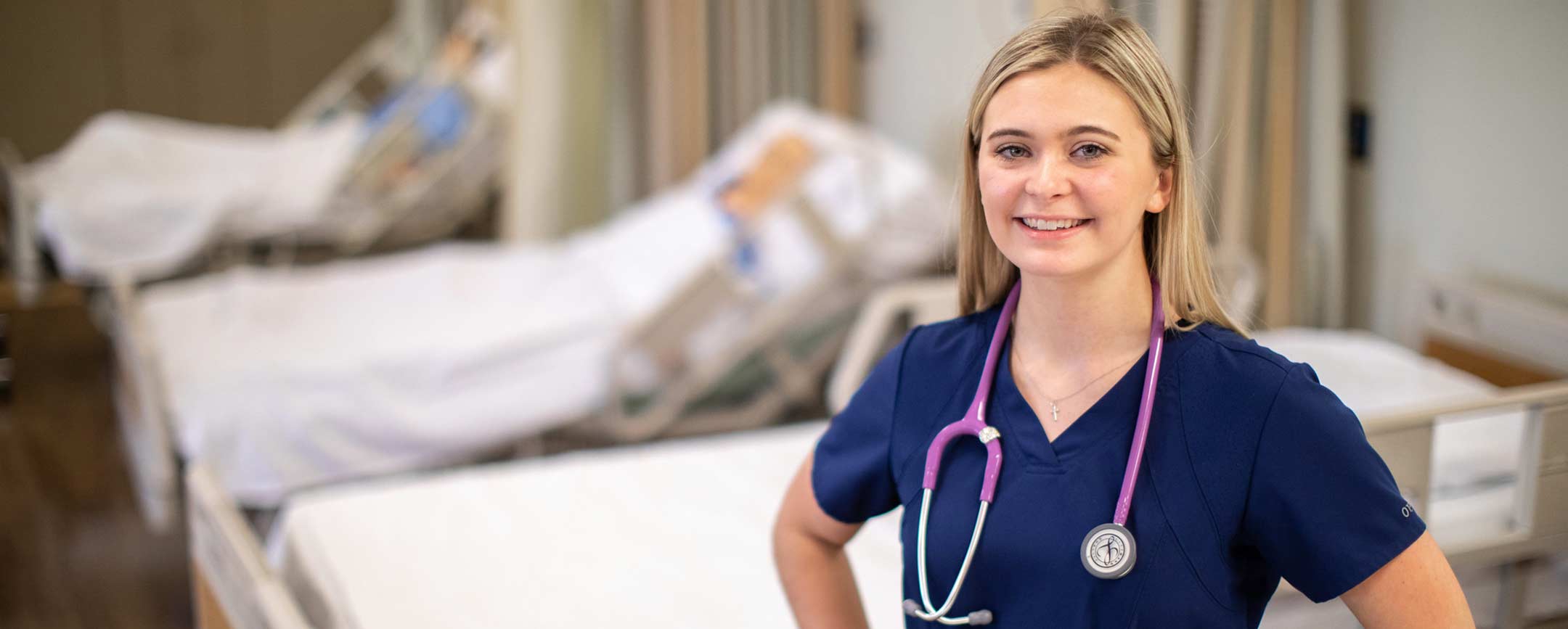 A nursing student in a simulation lab