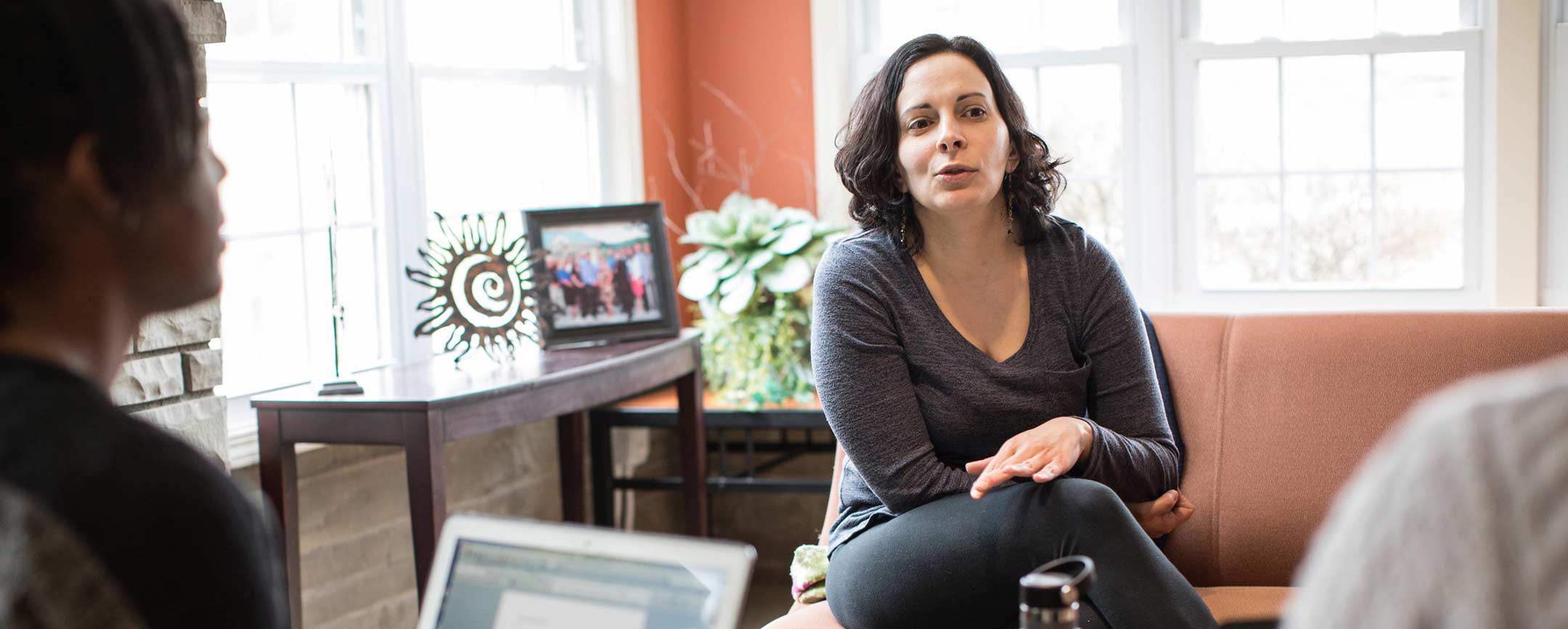 A psychologist talking to patients