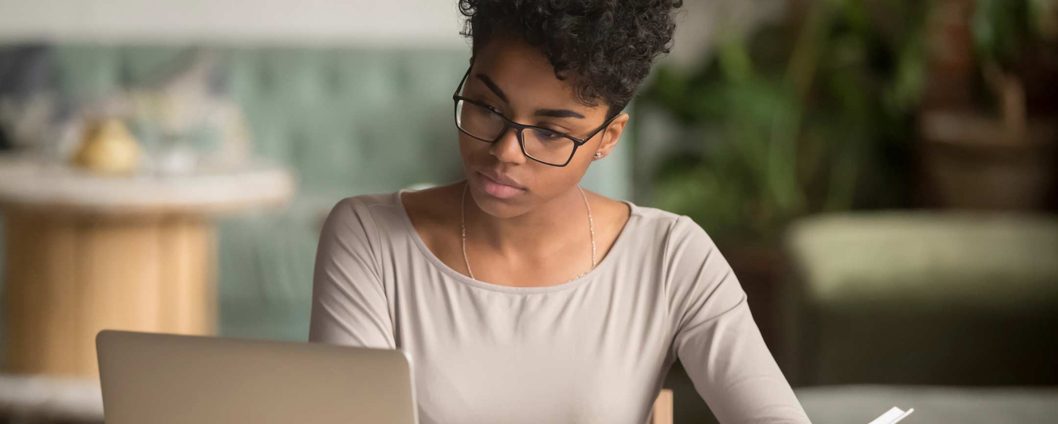 A social worker reviewing a case file