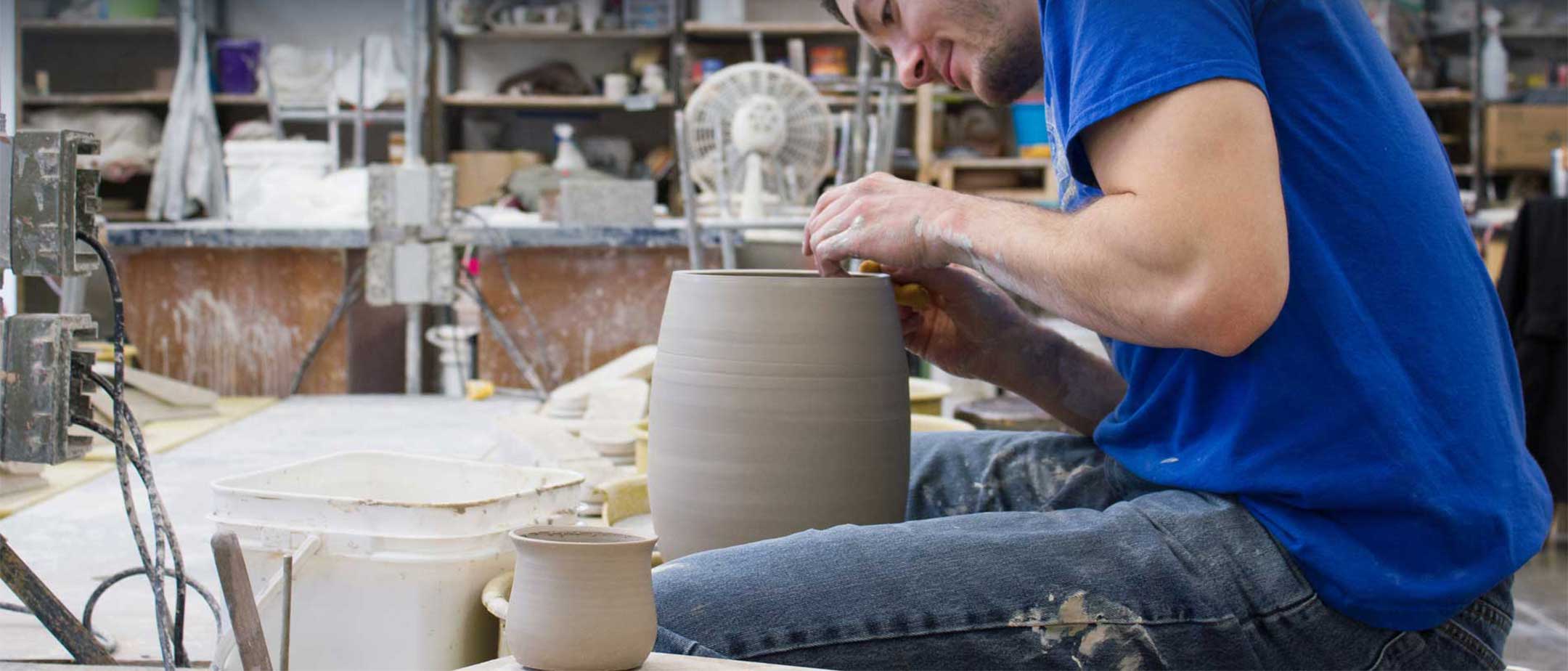 A student making some pottery