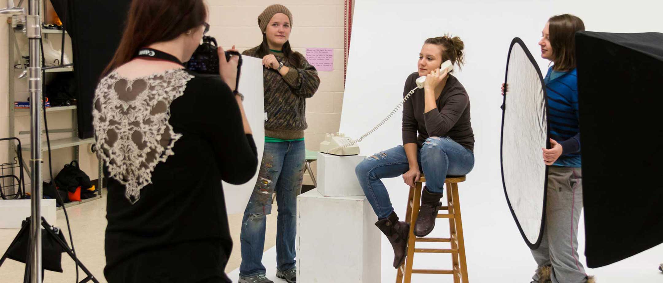 Students preparing for a photo shoot