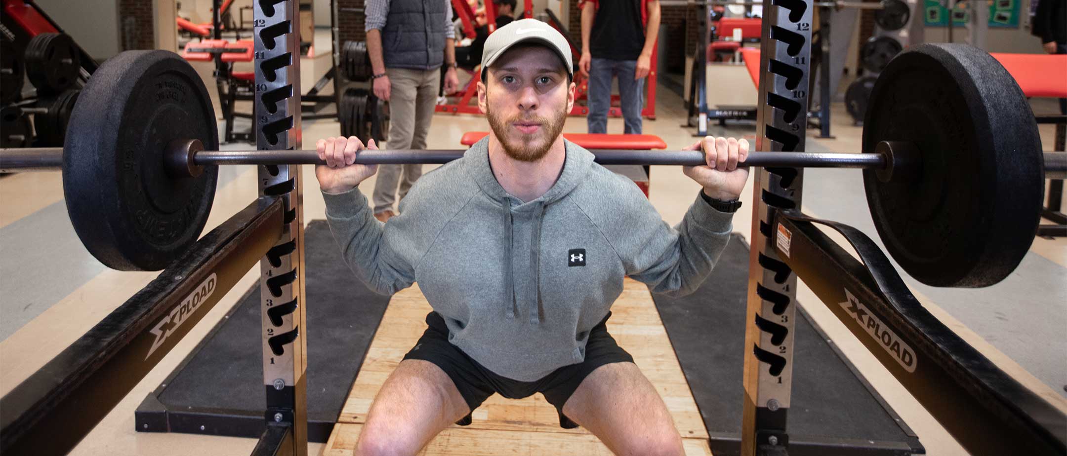 A student lifting weights