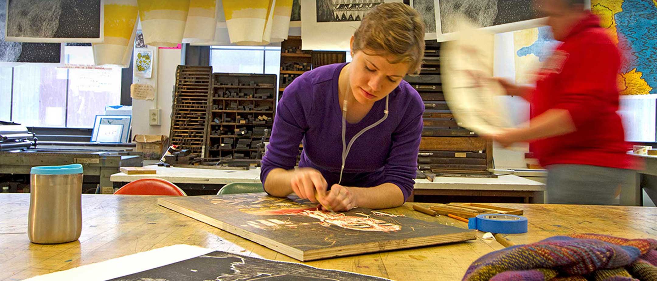 A student working in a printmaking class