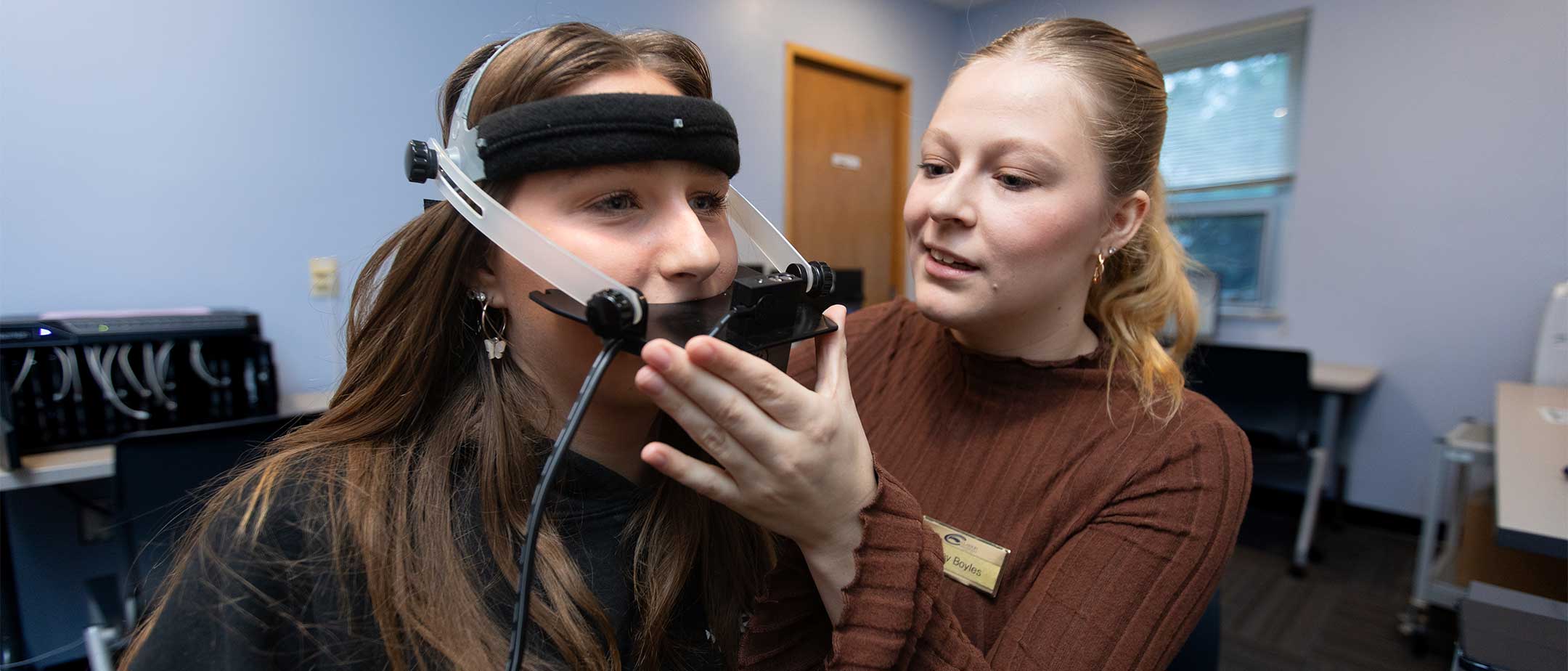 A student examining a patient