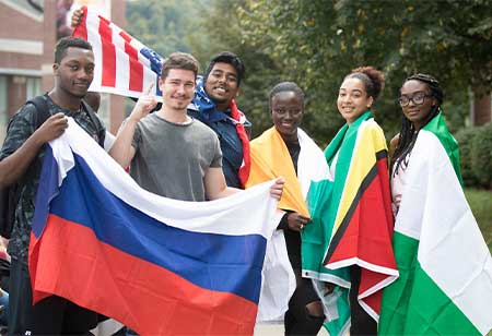 University students holding flags