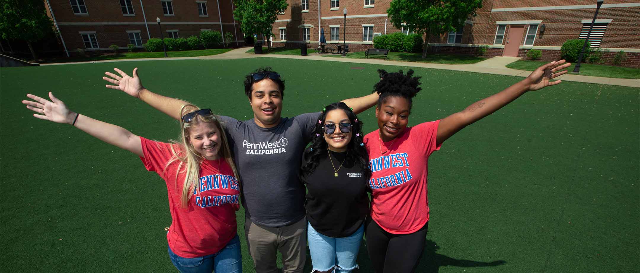 Students standing in a courtyard