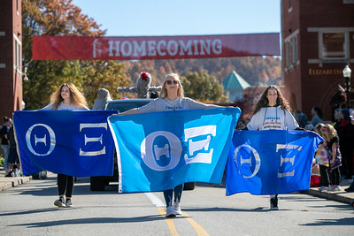 California students march in homecoming parade.