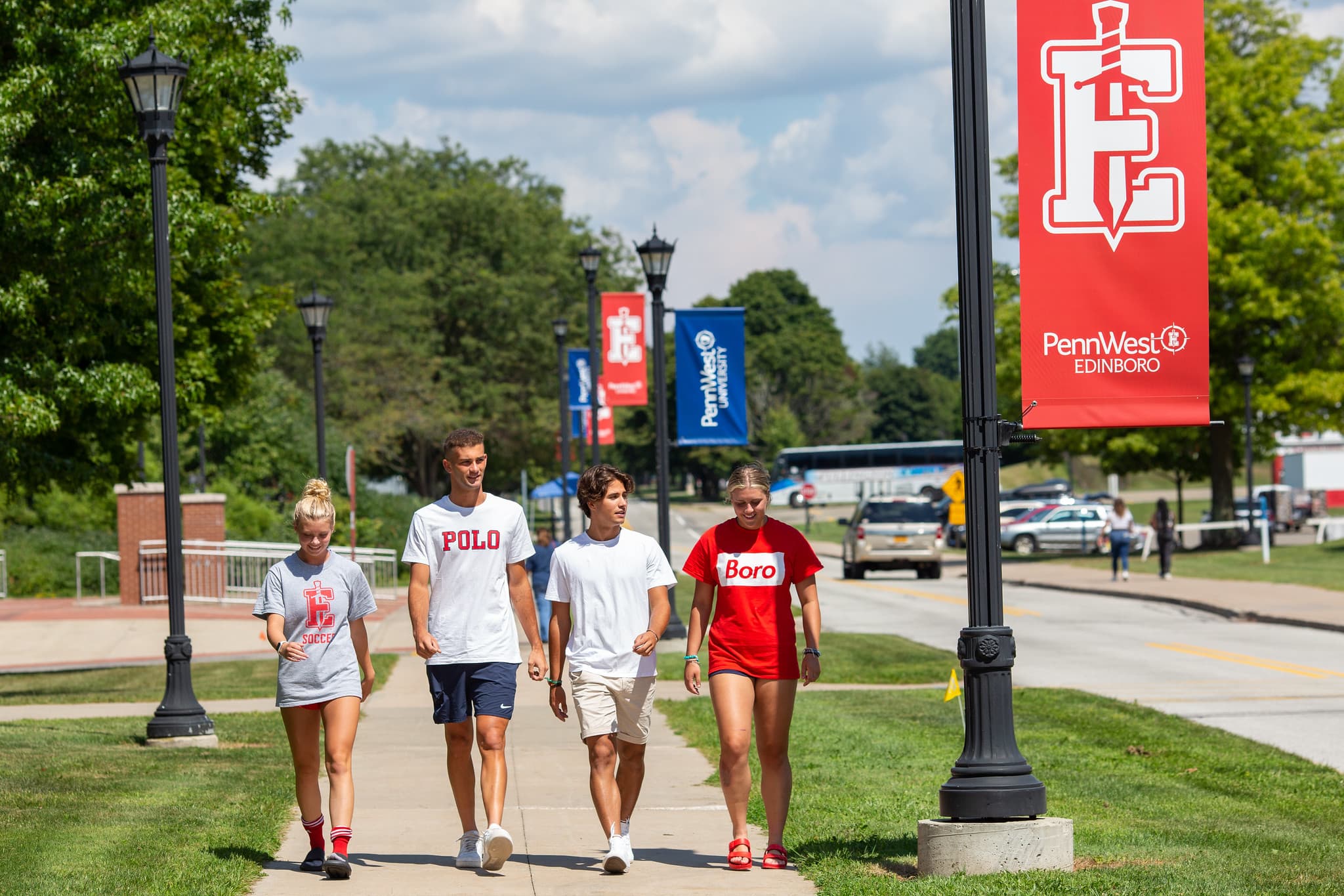 Students walking on campus of PennWest Edinboro. 