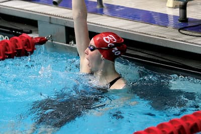 PennWest Edinboro swimmer celebrating.