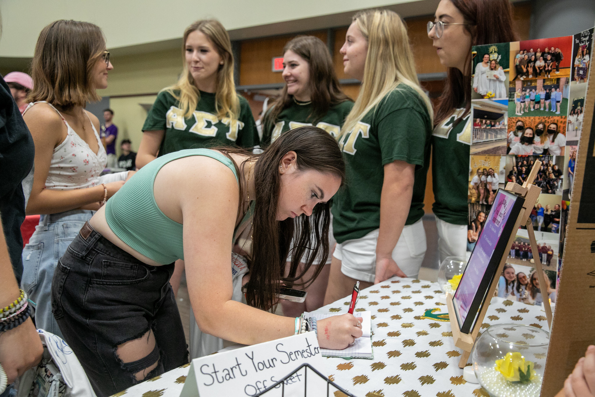 PennWest Cal Student signing up for an organization