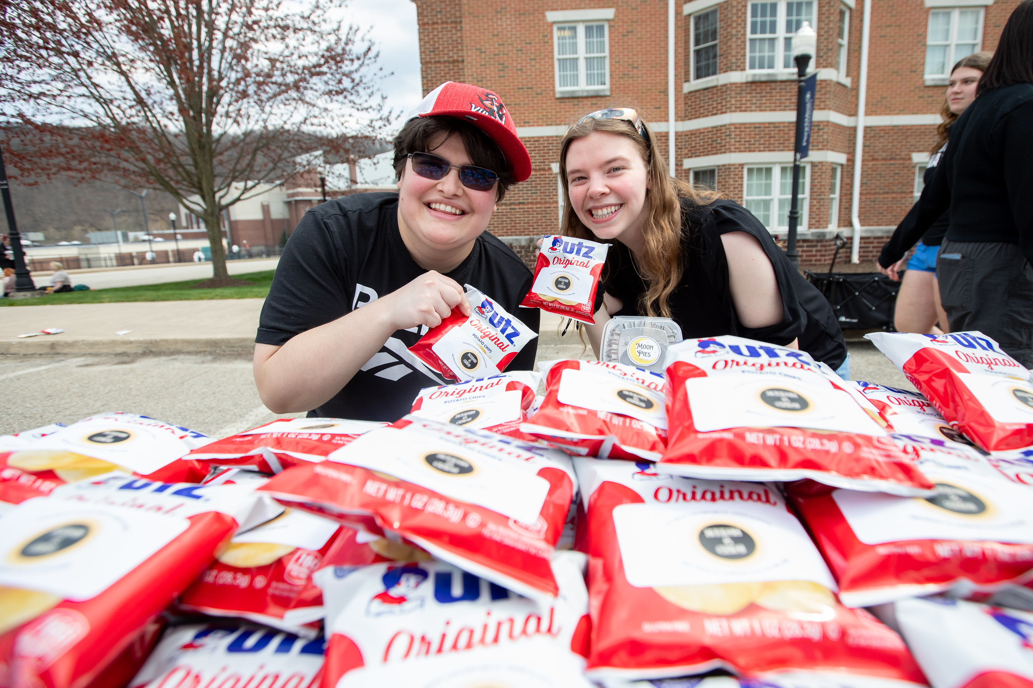 Students Handing Out Snacks