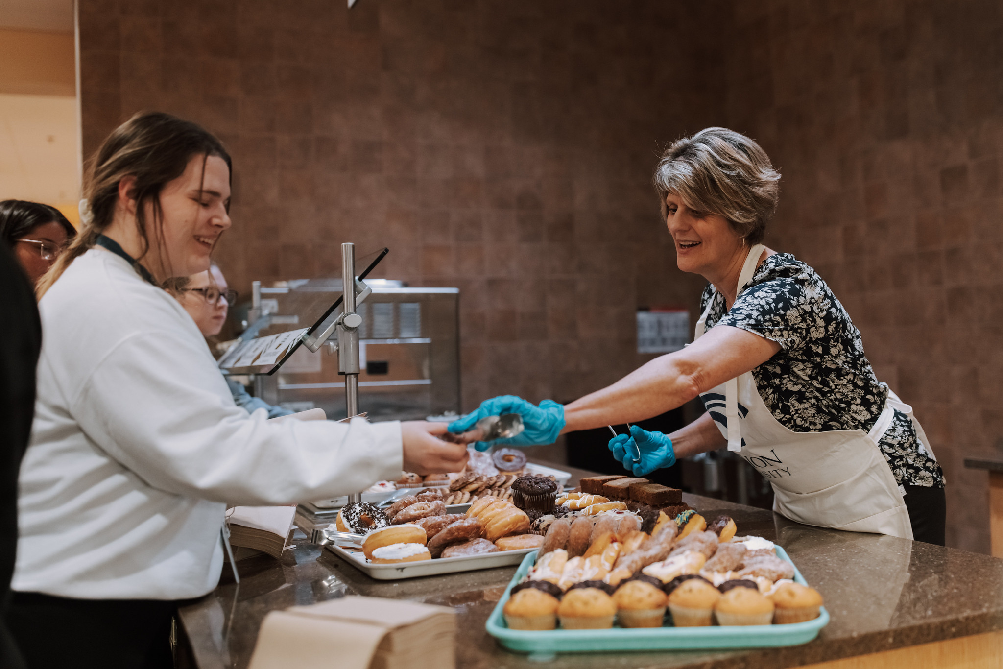 Student getting food from Eagle Commons