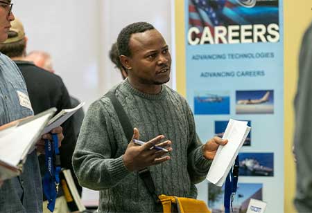 A student attending a career fair