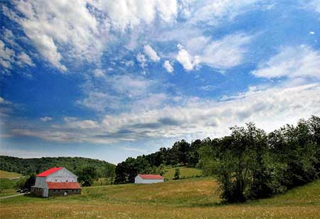 A view of the cloudy blue sky