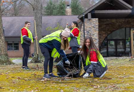 Students cleaning up the community