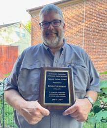 Dr. Kevin Courtright accepts his NEACJS Regional Fellow Award