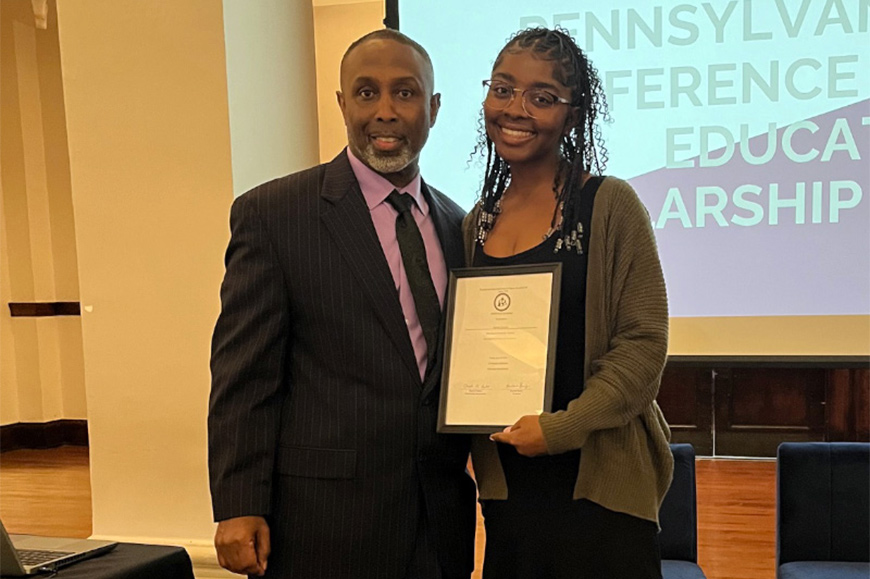 Chuck Baker and awardee Nydirah Torrence