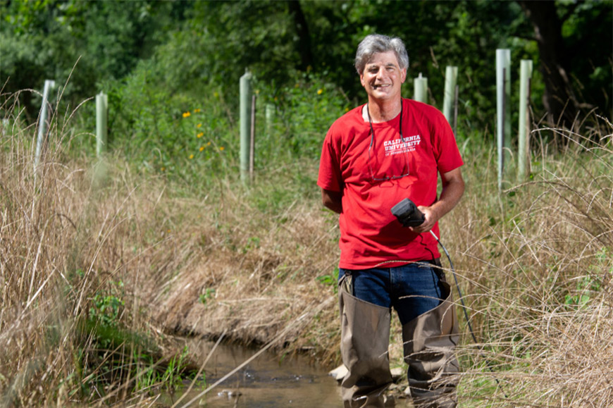 Dr. Robert Whyte in Wetlands. 