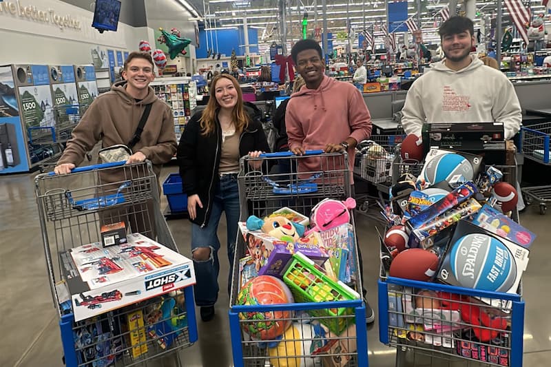 Student purchase items for Toys for Tots